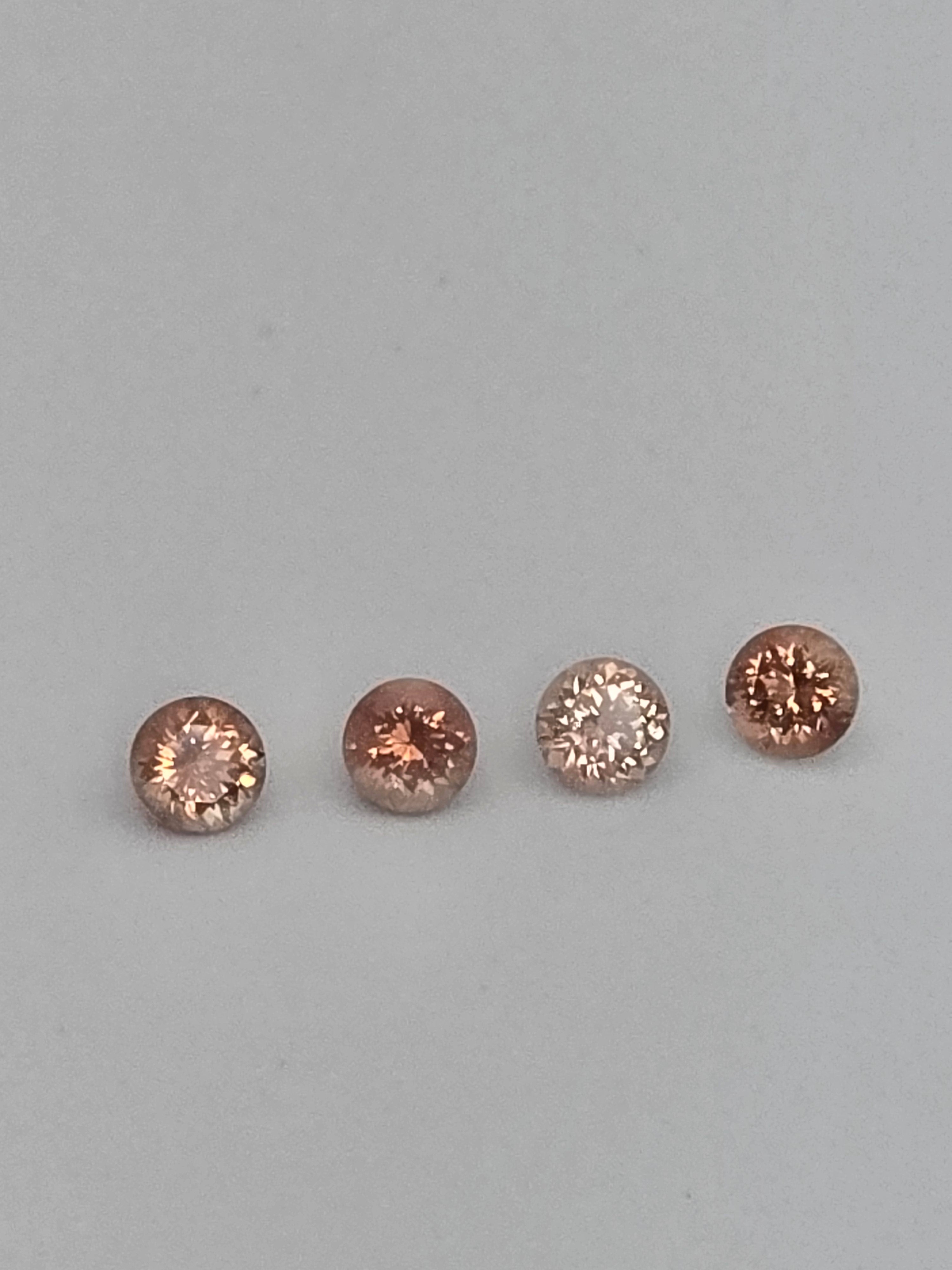 Lot of 4 Oregon Sunstones – 6mm Round, Strong Schiller & Flash (2.8 Carats Total)