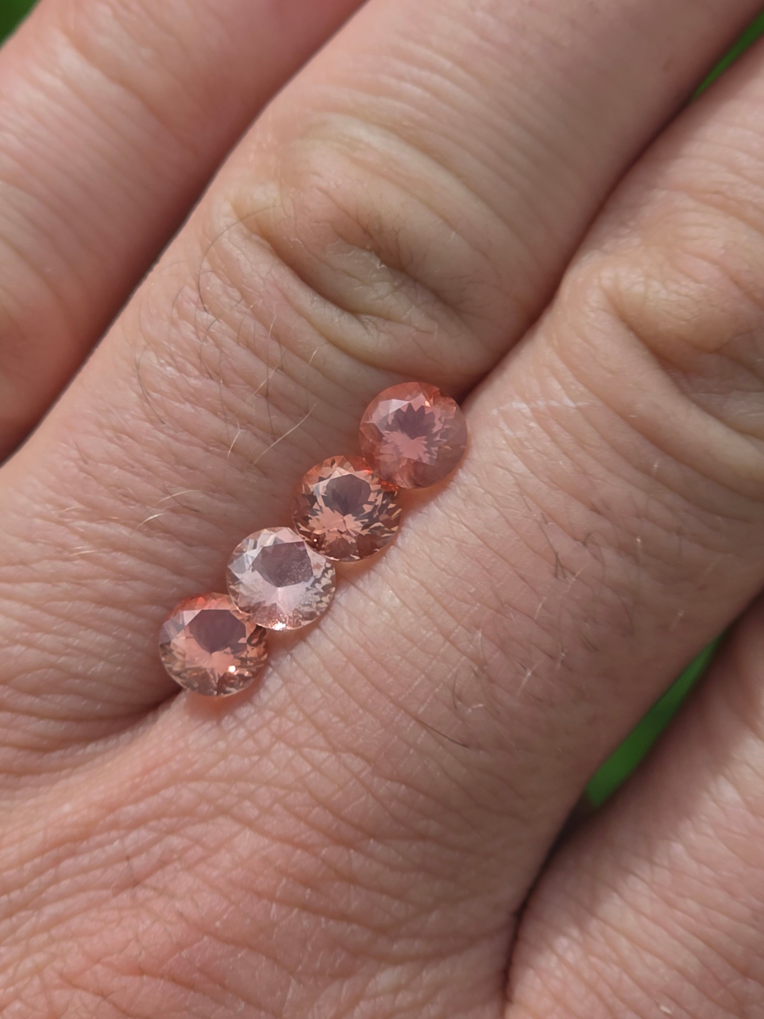 Lot of 4 Oregon Sunstones – 6mm Round, Strong Schiller & Flash (2.8 Carats Total)