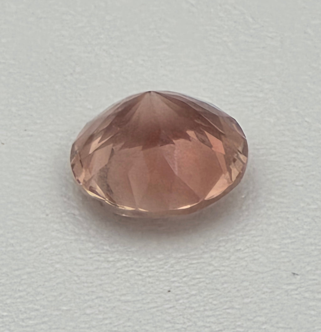 6mm Orange-Peach Schiller Oregon Sunstone – 0.75 Carats of Exceptional Fire A5 - Oregon Sunstone Wholesale