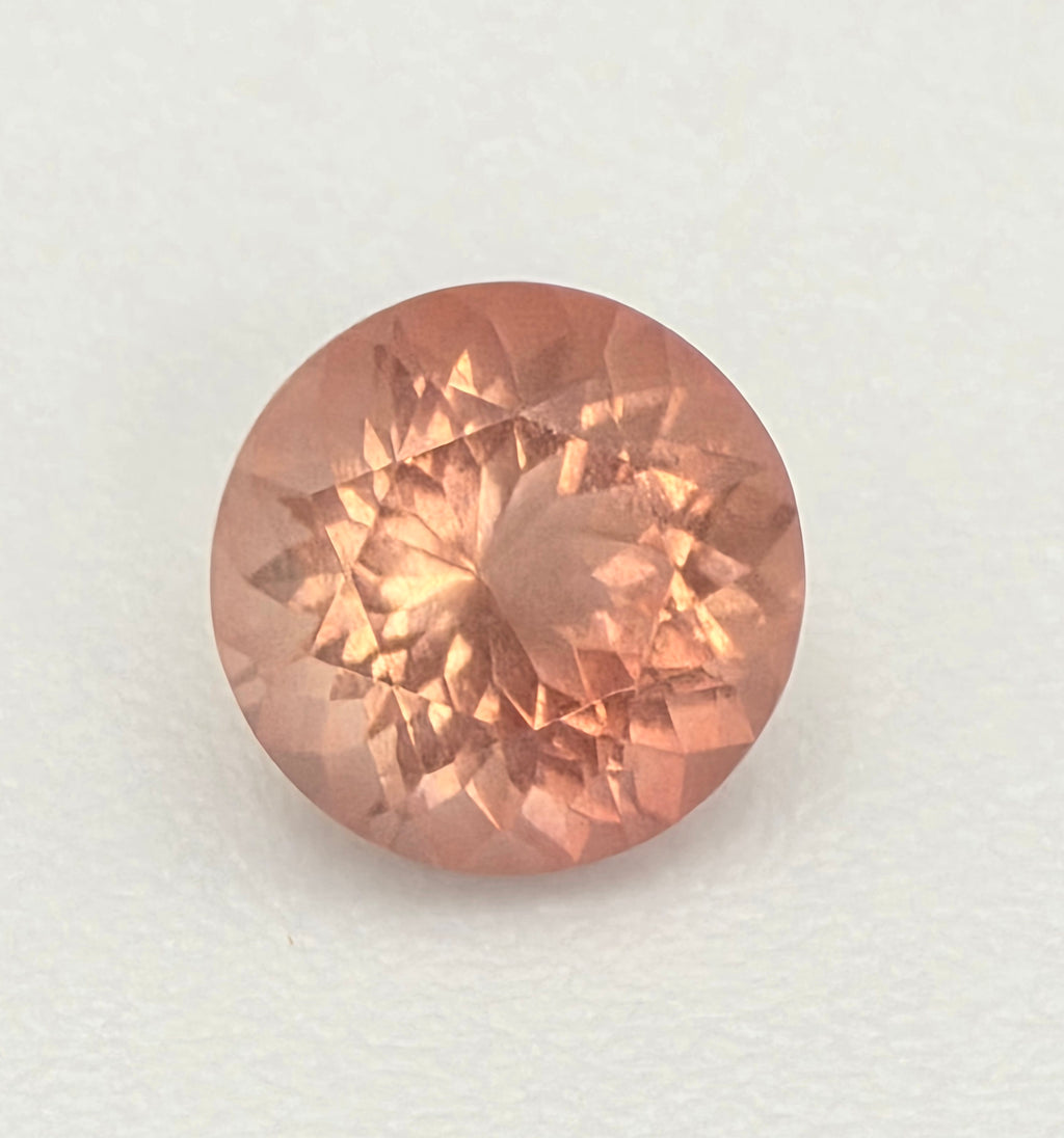 6mm Orange-Peach Schiller Oregon Sunstone – 0.75 Carats of Exceptional Fire A5 - Oregon Sunstone Wholesale