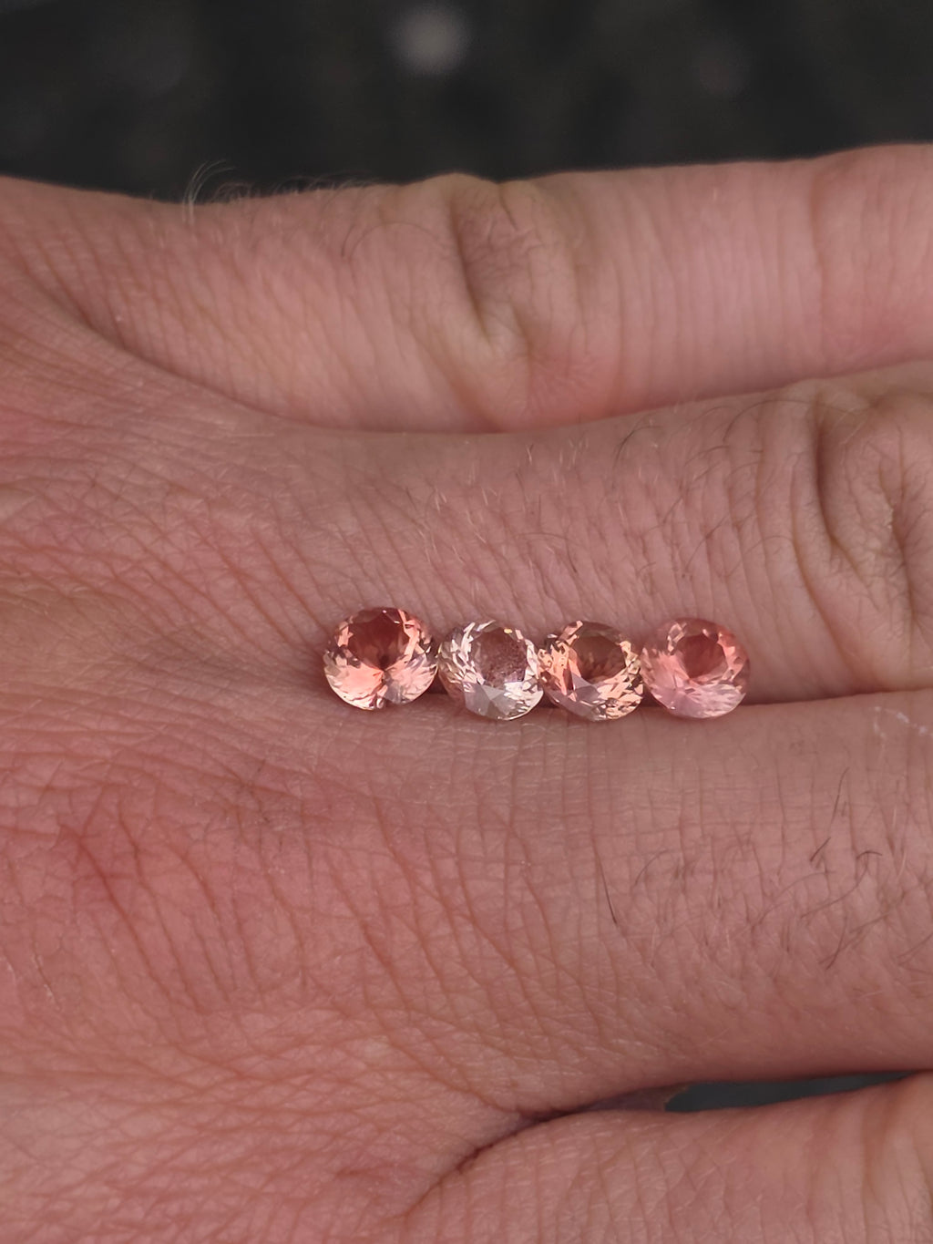 Lot of 4 Oregon Sunstones – 6mm Round, Strong Schiller & Flash (2.8 Carats Total)